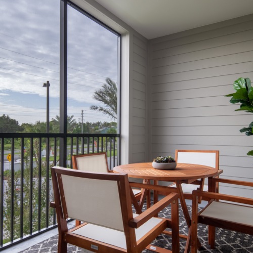 screened in porch with seating