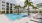 a swimming pool in front of a building