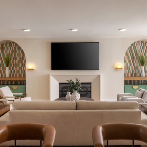 a large room with a fireplace