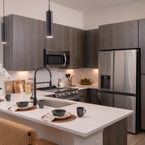 a kitchen with bar stools