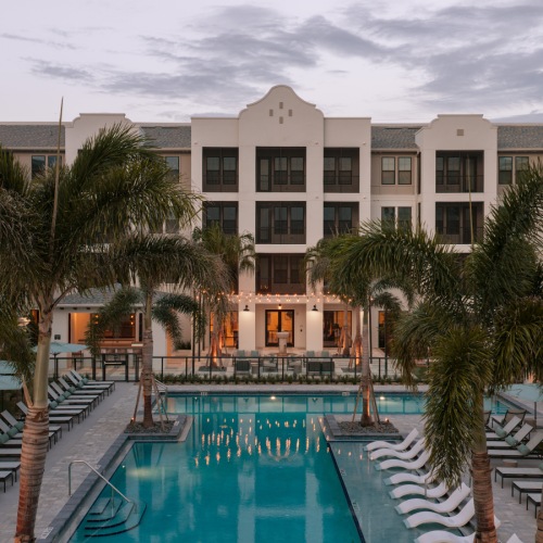 a pool in front of a building